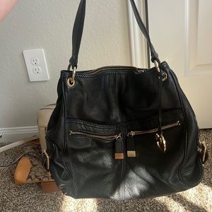 Black Michael Kors over the shoulder